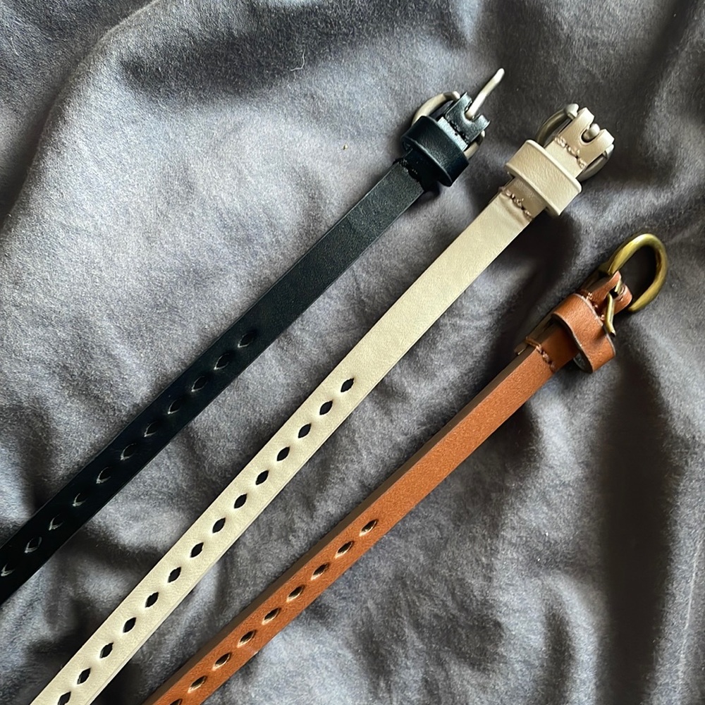 Three belts. Never worn. Brown black and cream
